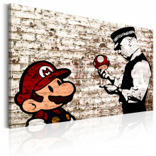 Kép - Banksy rajz szakadt téglafalon